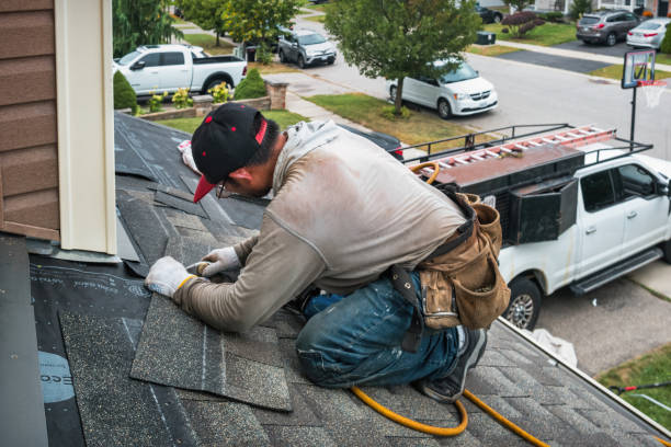 Professional Emergency Roof Repair technician working in Riverhead, NY